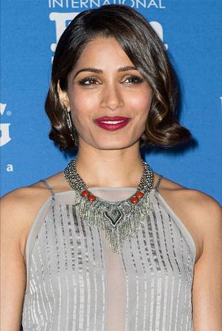 The Trick To Frieda Pinto’s Modern Grace Kelly Hair Moment